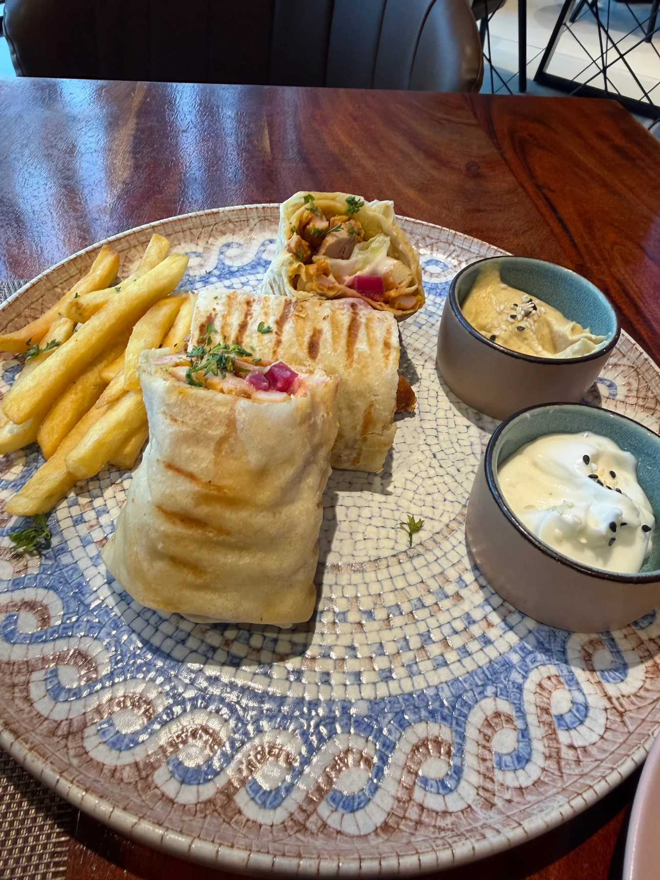 Chicken shawarma platter with fries, hummus and garlic mayo.